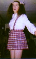 cumslut Crystal poses in school girl costume